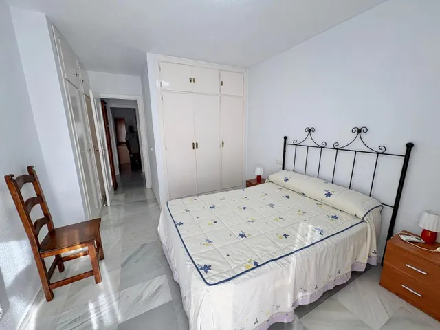 Casa adosada con dos patios privados y piscina comunitaria en Caleta de Vélez — 11