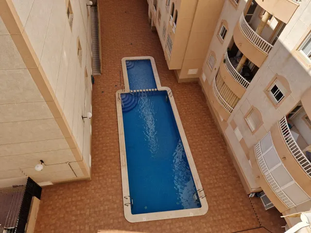 Apartamento soleado 2 dormitorios con piscina — 9
