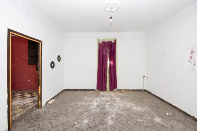 CONJUNTO DE PISOS Y PLANTA BAJA EN GRANADA CON 490 m2 — 24