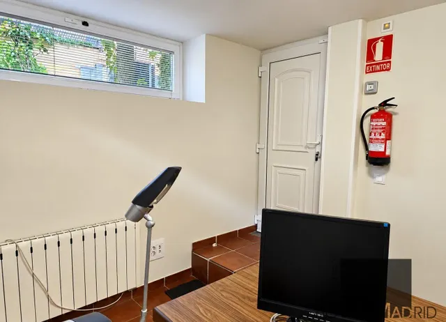ESTUDIO HOME MADRID ofrece oficina profesional de 52,51 m2, con jardín circundante, en el barrio de Peñagrande. — 10