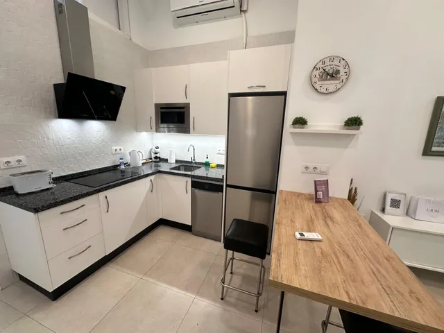 APARTAMENTO EN EXPLOTACIÓN TURÍSTICA — 27