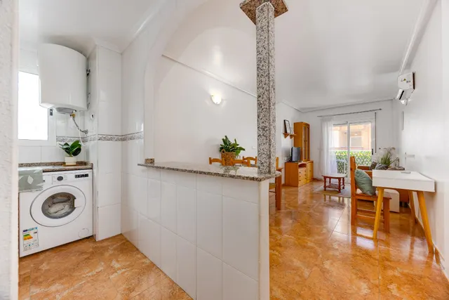 APARTAMENTO DE DOS DORMITORIOS CON VISTAS A LA LAGUNA ROSA Y CON PISCINA COMUNITARIA — 14