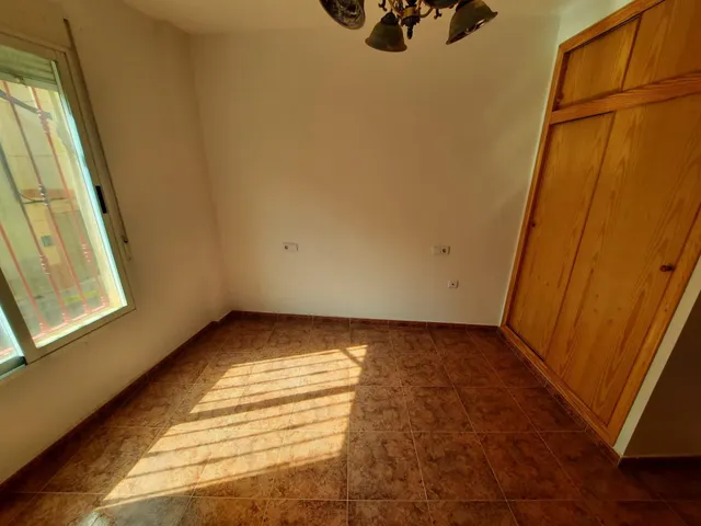 VIVIENDA EN PLANTA BAJA — 11