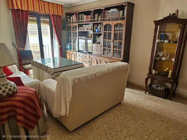 Piso de 4 dormitorios con plaza de garaje en San Basilio, con terraza de 20 m2 anexa al trastero en la cubierta. — 20