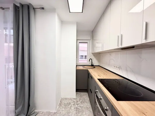 Apartamento reformado de 2 dormitorios en primera línea de Playa del Cura con vistas laterales al mar — 15