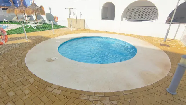 Apartamento de 1 dormitorio con terraza y piscina en Urbanización Milenio III en San Juan de los Terreros — 26