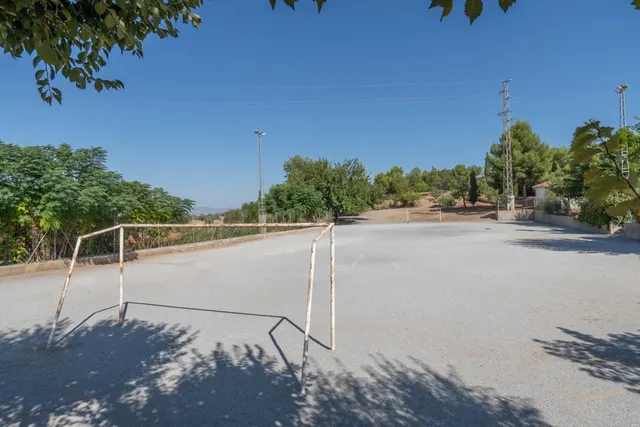 Magnífico solar de 1.002 m2 destinado a chalets individuales en la Urbanización Molino Ato de Otura — 48