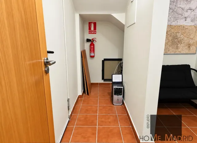 ESTUDIO HOME MADRID ofrece oficina profesional de 52,51 m2, con jardín circundante, en el barrio de Peñagrande. — 12