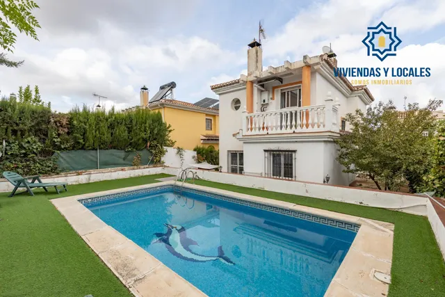 Casa independiente con piscina en La Zubia. — 40