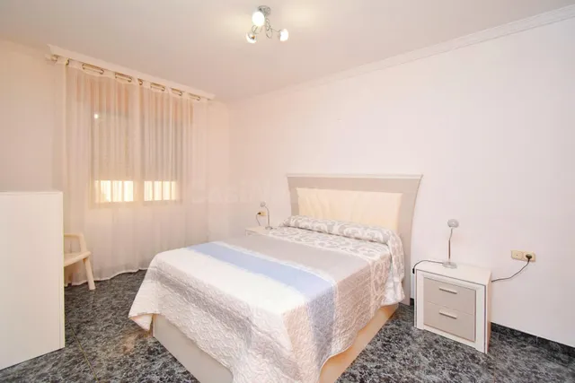 VIVIENDA DE PLANTA BAJA CON SOLARIUM Y COCHERA — 5