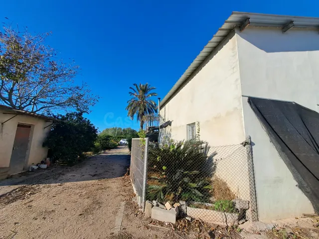ESTUPENDO TERRENO CON VIVIENDA CERCANO AL PUEBLO - foto 5