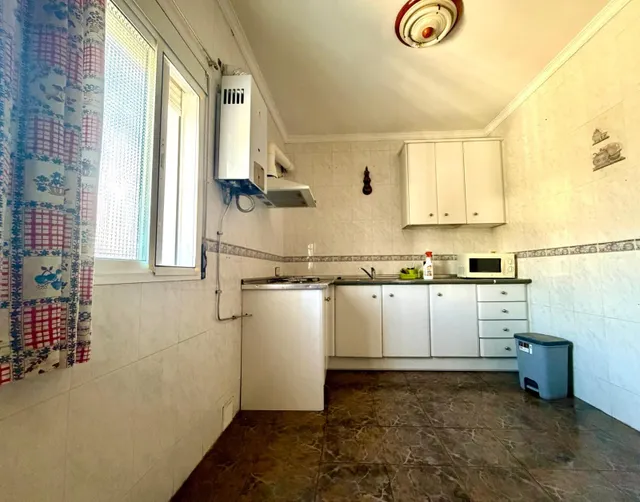 Casa de pueblo en pleno centro de La Joya con dos viviendas independientes y parcela de 500 m2 — 24