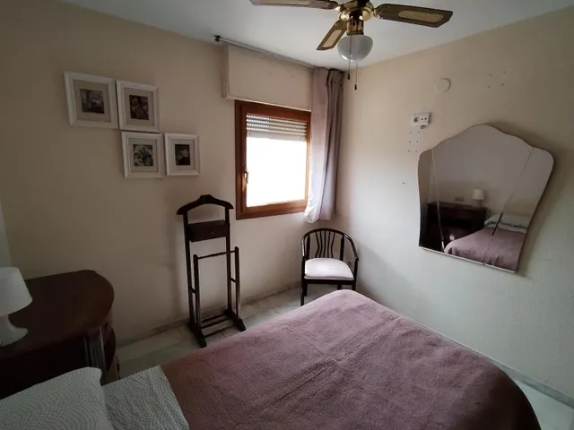 Apartamento de esquina con 2 dormitorios y terraza acristlada en 1 Linea playa Levante. — 16