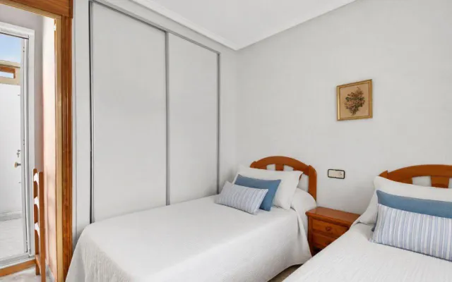SERENA I. ACOGEDOR ADOSADO EN ESQUINA CON SOLARIUM PRIVADO, ORIENTACIÓN SUR — 12