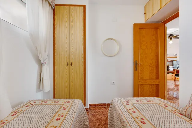 Apartamento 2 dormitorios con orientación sur y piscina comunitaria. — 18