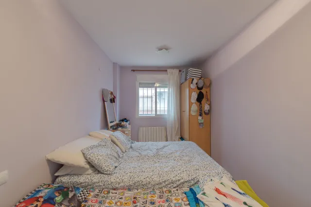 Una vivienda ideal con 2 dormitorios tanto para vivir con total comodidad en planta baja y sin barreras como para inversión segura. ¡Lista para entrar a disfrutar! En Churriana de la Vega. — 24
