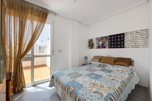 ÁTICO CON TERRAZA DE 32 M2 Y PLAZA DE GARAJE — 23