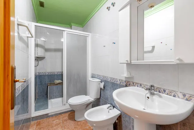 Acogedor piso en planta baja con piscina comunitaria — 15