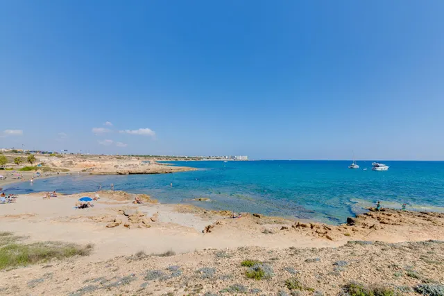 Bungalow de 2 dormitorios y piscina comunitaria en Orihuela Costa — 38