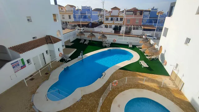 Apartamento de 1 dormitorio con terraza y piscina en Urbanización Milenio III en San Juan de los Terreros — 11