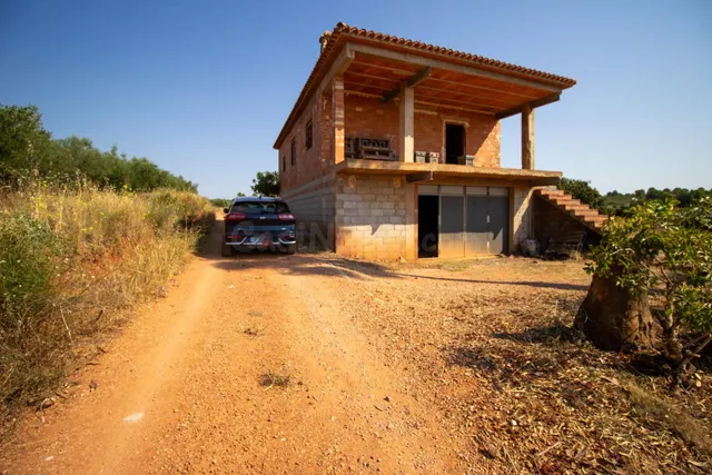 VENTA DE CASA DE CAMPO DOS TERRENOS