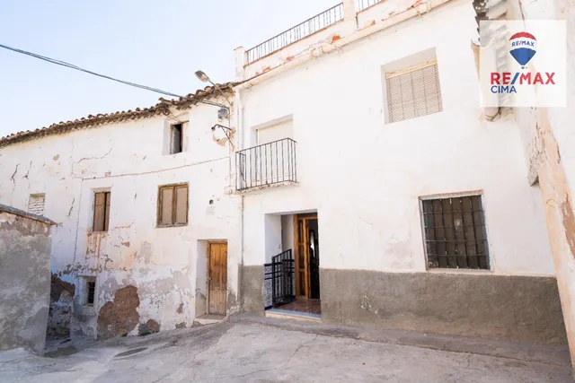 DOS CASAS MAS PARCELA DE 900  METROS — 12