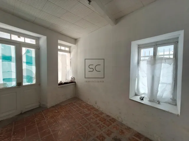 Casa adosada en el centro de Cariño. — 8