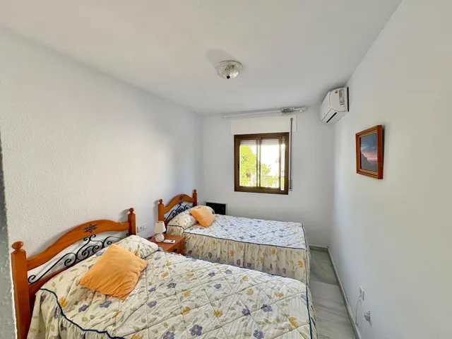 Casa adosada con dos patios privados y piscina comunitaria en Caleta de Vélez — 15