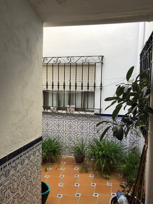Edificio con piso dúplex y local en planta baja en el centro de Alhaurin de la Torre. — 13