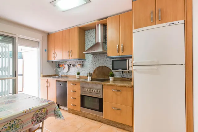 Dúplex amplio de 5 dormitorios con patio, terraza y buhardilla en San José de la Montaña — 9