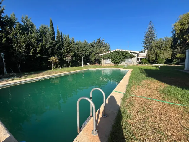 GRAN CHOLLO-FINCA URBANA DE 2600 METROS CON GRAN CHALET , DOS  VIVIENDAS,  TRASTERO Y PISCINA — 12