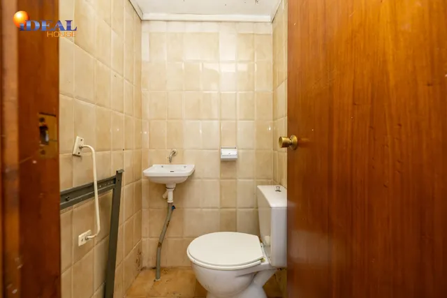 Local comercial junto a calle Alhamar. Ideal para oficina, despacho o almacén. Muy económico — 12