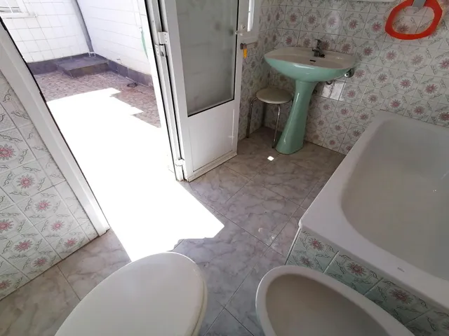 Casa en Alquiler con Patio y 3 Dormitorios — 25