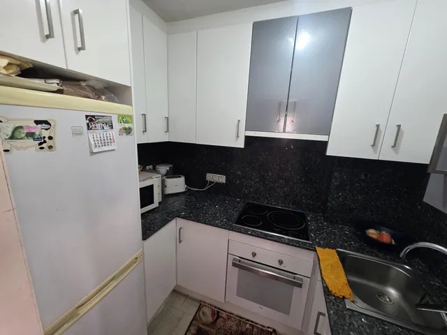 Piso de 1 dormitorio con plaza de garaje numerada — 9