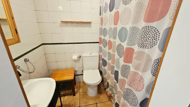 CASA PLANTA BAJA CON 2 VECINOS CON JARDÍN — 9