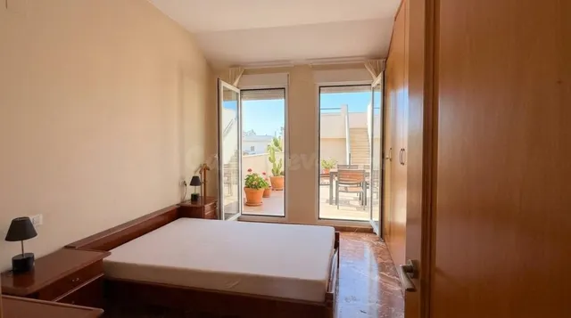 Ático dúplex con terrazas, garaje y trastero — 8