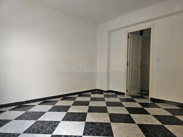 Piso en planta baja en el centro — 9