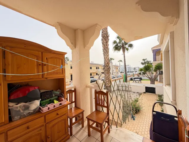 BUNGALOW EN PLANTA BAJA EN ROJALES CON JARDÍN DE 90 M2. 2 DORM. 1 BAÑO. SUPERFICIE DE 75 M2. PISCINAS COMUNITARIAS. — 34