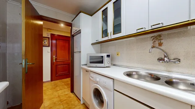 Piso de tres dormitorios de nueva construcción y con garaje — 23