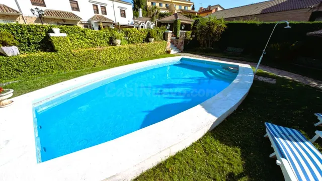Exclusiva vivienda de planta baja en la prestigiosa Urbanización R-66 con 1.000 m2 de parcela y espectacular piscina privada — 8