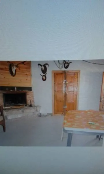 TERRENO URBANO CON CASA DE MADERA Y CASA DE CEMENTO. — 8
