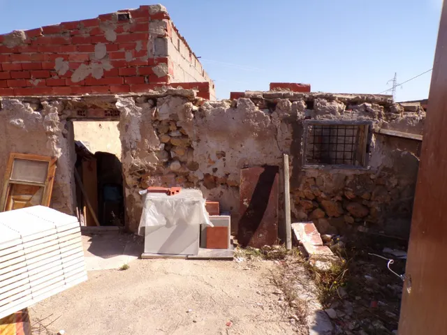 PARCELA CON CASITA — 12