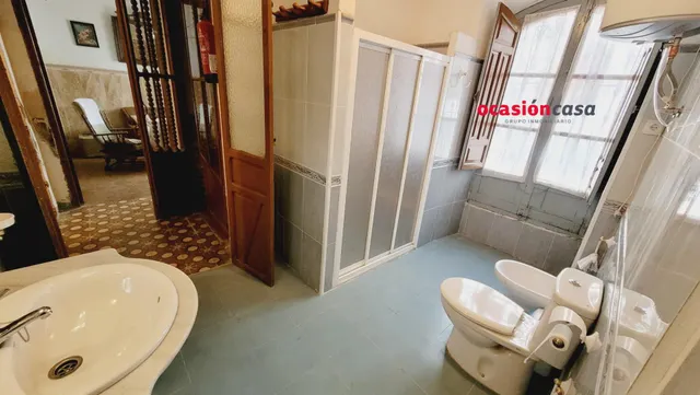 SE VENDE PLANTA BAJA CON COCHERA — 12