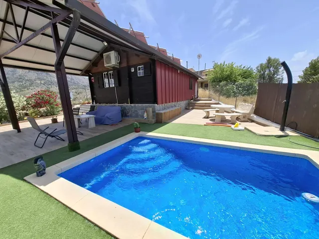 Se vende coqueta casa de madera con terreno en el rellano de molina — 11