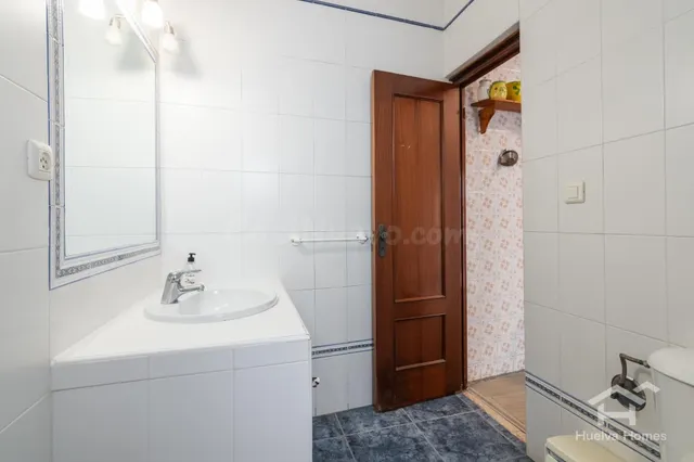 Casa tradicional con patio y acceso por dos calles en el centro de Ayamonte — 18