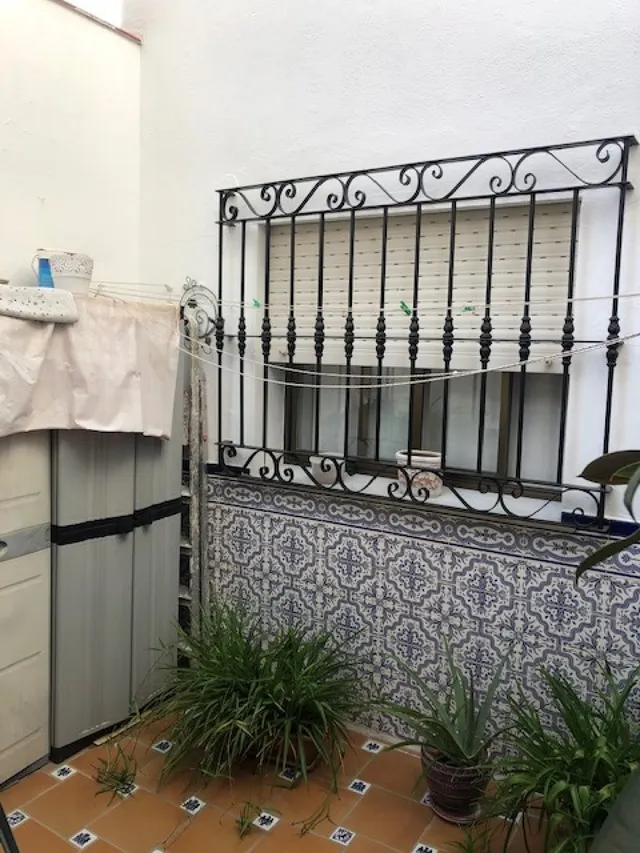 Edificio con piso dúplex y local en planta baja en el centro de Alhaurin de la Torre. — 14