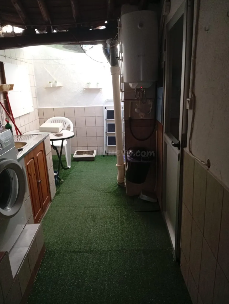 Casa de planta baja con buhardilla y patio en Alía