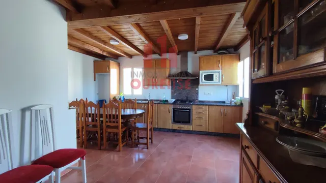 CASA DE PIEDRA CON PARCELA EN XUNQUEIRA DE AMBÍA, PRÓXIMA A SANDIÁS. — 14