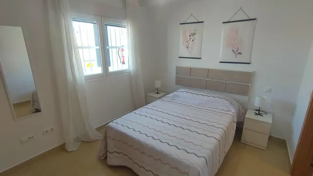Apartamento de 1 dormitorio con terraza y piscina en Urbanización Milenio III en San Juan de los Terreros — 16