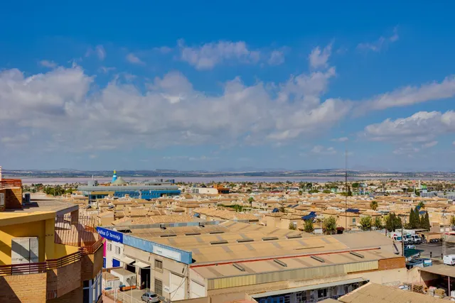 APARTAMENTO DE DOS DORMITORIOS CON VISTAS A LA LAGUNA ROSA Y CON PISCINA COMUNITARIA — 34